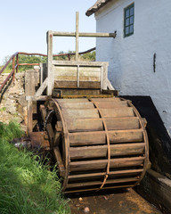 historic watermill with overshot waterwheel