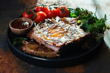 Grilled pork ribs with vegetables. Copy space