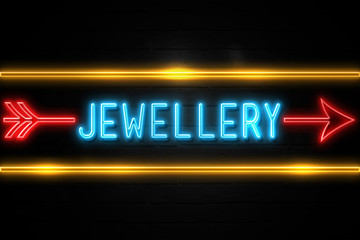 Obraz premium Jewellery - fluorescent Neon Sign on brickwall Front view