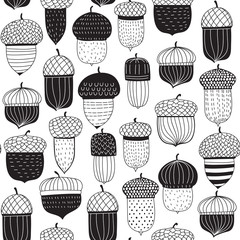 Seamless pattern made of doodled acorns. © katerinamk