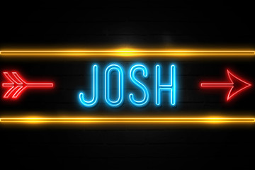 Obraz premium Josh - fluorescent Neon Sign on brickwall Front view
