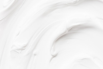 Fototapeta na wymiar White texture of cream background