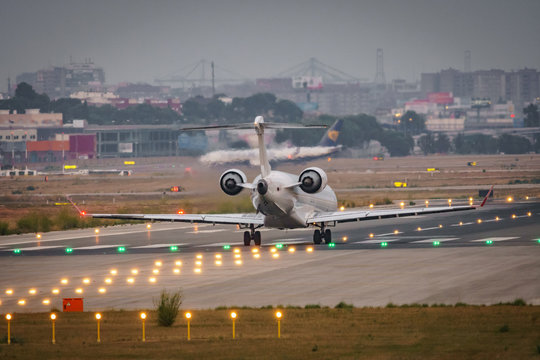 Modern small jet landing in the airport