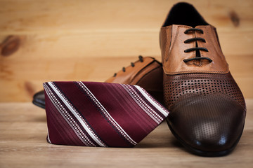 Man's style. Male shoes and tie