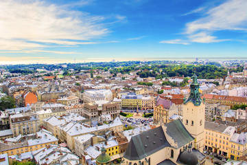 Obraz premium Beautiful view of the Town Hall Tower, Adam Mickiewicz Square and the historical center of Lviv, Ukraine