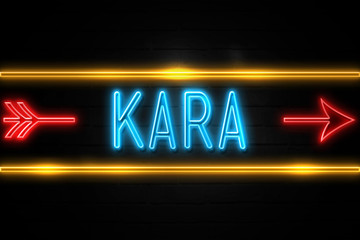 Kara  - fluorescent Neon Sign on brickwall Front view