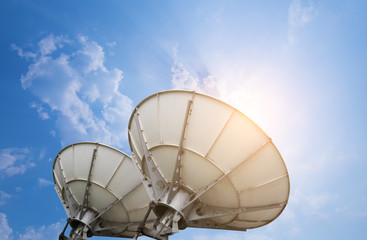 satellite dish antennas under sky