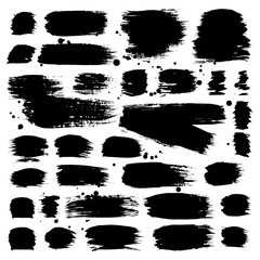 Set of brush strokes and splashes. Hand drawn design elements.