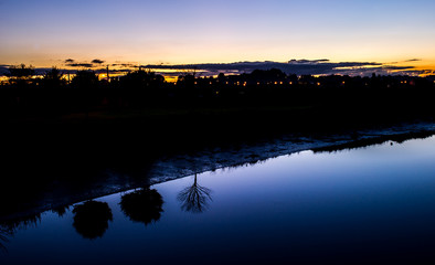 Reflection story in a blue water - Newry Road, Dundalk, County Louth, Ireland, Europe