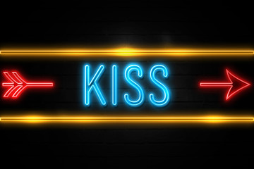 Kiss  - fluorescent Neon Sign on brickwall Front view