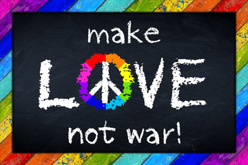 colorful rainbow blackboard with make love not war message 