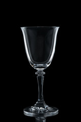 Wineglass closeup on black background