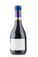 Red wine bottle closeup on white background