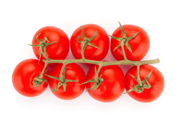 Cherry tomatoes closeup isolated on white background
