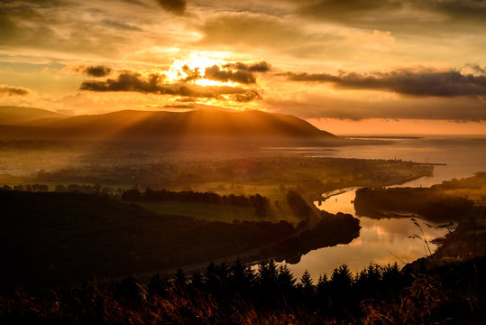 The Giant Scanner: early in the morning the Sun is already scanning the countryside looking for places to warm up after a cold night, Warrenpoint, Mourne Mountains, County Down, Northern Ireland.