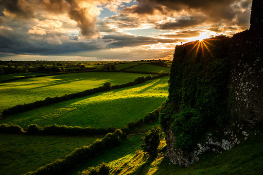The Big Race: Wind and Sun bet tonight and launched an uncommon race between Clouds and Shadows ... who won? taken at Roche Castle, near Dundalk, County Louth, Ireland