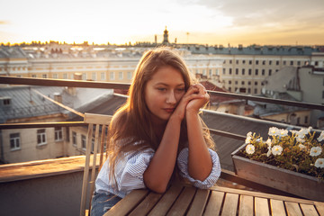 Teenage girl on roof