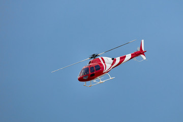 Fototapeta na wymiar Radio controlled model helicopter in flight