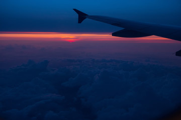 Fototapeta na wymiar Sunset view from an airplane