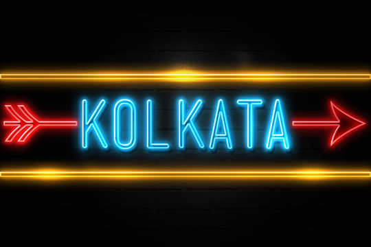 Kolkata  - fluorescent Neon Sign on brickwall Front view