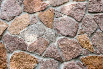 Old stone wall texture background. Stone fence.