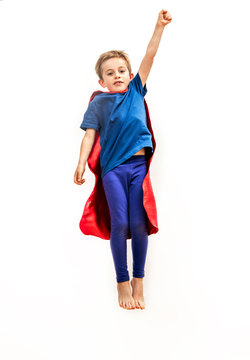 Isolated Kid Reaching High Like Powerful Superhero, Pretending Reaching Something