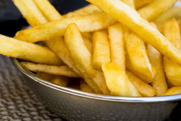 Golden French fries potatoes ready to be eaten