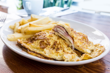 omelet with ham tomato and French fries