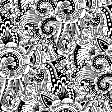 Seamless ornamental  ethnic  pattern. Floral background with flowers, berries, waves, leaves, curly lines. Good for wallpaper, pattern fills, textile, fabric, wrapping, surface textures.