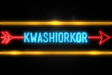 Kwashiorkor  - fluorescent Neon Sign on brickwall Front view