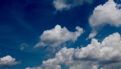 The white cloudscape in the blue sky.