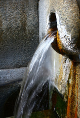 Bollente of Acqui Terme. Natural source of thermal water, coming out of rock at 75 degrees with a...