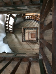 Top view of the internal wooden spiral stairwell trumpet to an ancient navigation lighthouse