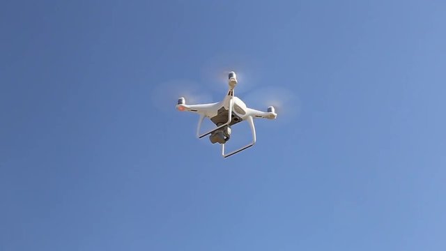 Quadcopter drone flying, technology and surveillance concepts