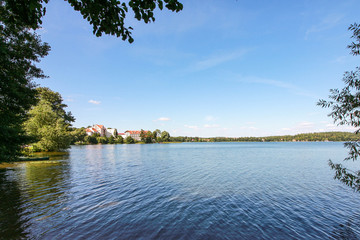 Czos lake and a panorama of Mragowo on a beautiful summer day.