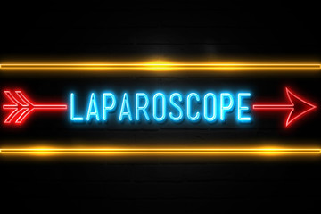 Laparoscope  - fluorescent Neon Sign on brickwall Front view