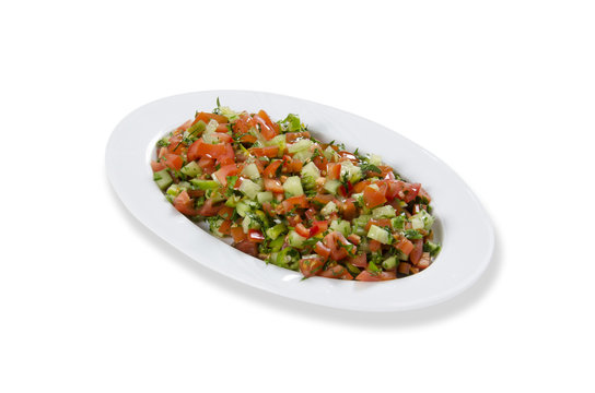 Turkish Coban salata or Shepherds salad in white bowl.
