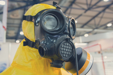 Mannequin dressed in a chemical protection suit. industry