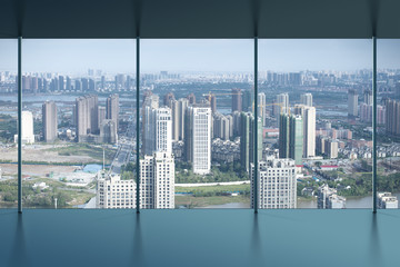 Obraz na płótnie Canvas Aerial view of city buildings and river, China Nanchang
