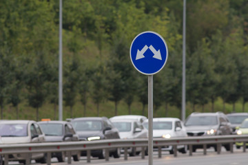Street sign o busy road - traffic on highway