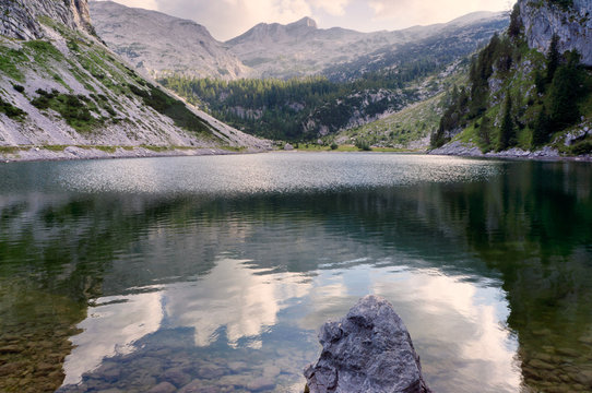 Reflections in Krn lake, Julian alps.