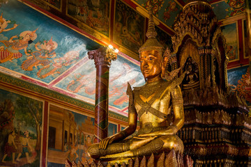 Buddha statue Inside the pagoda of Wat Phnom,
