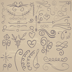 Calligraphic illustration set for text vintage ornaments with floral elements arrows, hand drawn
