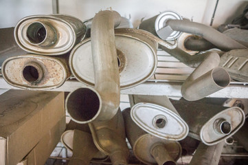 Pile of exhaust pipes at the factory warehouse