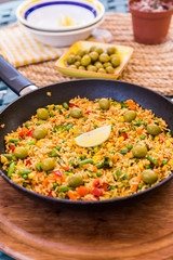 Vegetarian paella with olives
