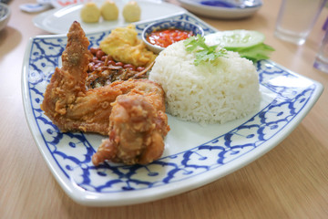 nasi lemak or rice with fried fish and fried chicken
