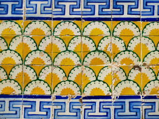Portuguese tiles (azulejos) with unique blue, green and yellow pattern in Lisbon