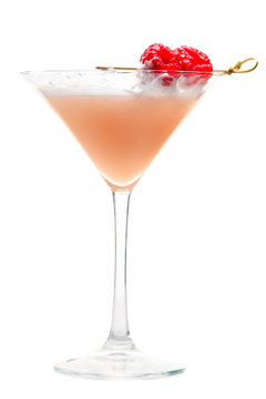 Martini glass of French Horn cocktail. Cold fresh pale pink cocktail with raspberry isolated on white background
