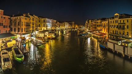 Italy beauty, late evening view from famous canal bridge Rialto in Venice , Venezia