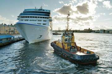 boat pulling ship